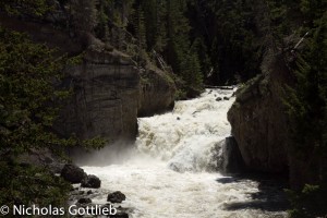 Firehole Falls, about halfway down the run. Probably 30' top to bottom, looks like a sweet boof-boof on river right.